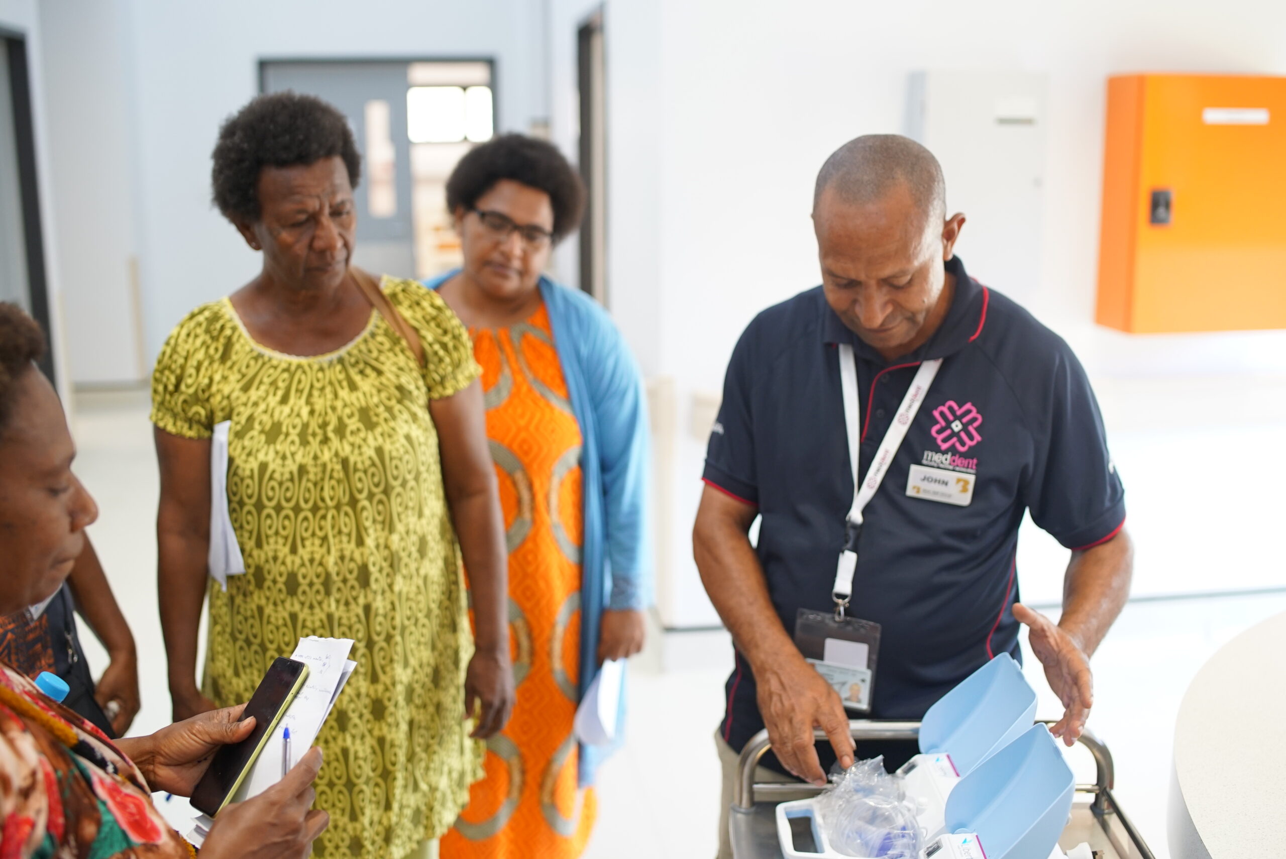 Medical professionals working in a healthcare facility providing patient care